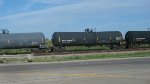 NATX 303638 & 2 Tank Cars Between